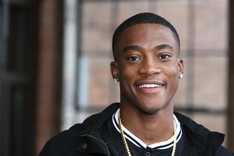 Close up of a young black male smiling