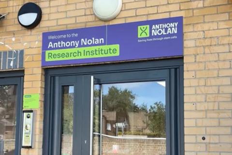 The front door of the Anthony Nolan Research Institute with colourful branding above