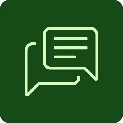 A green graphic icon of two speech bubbles 