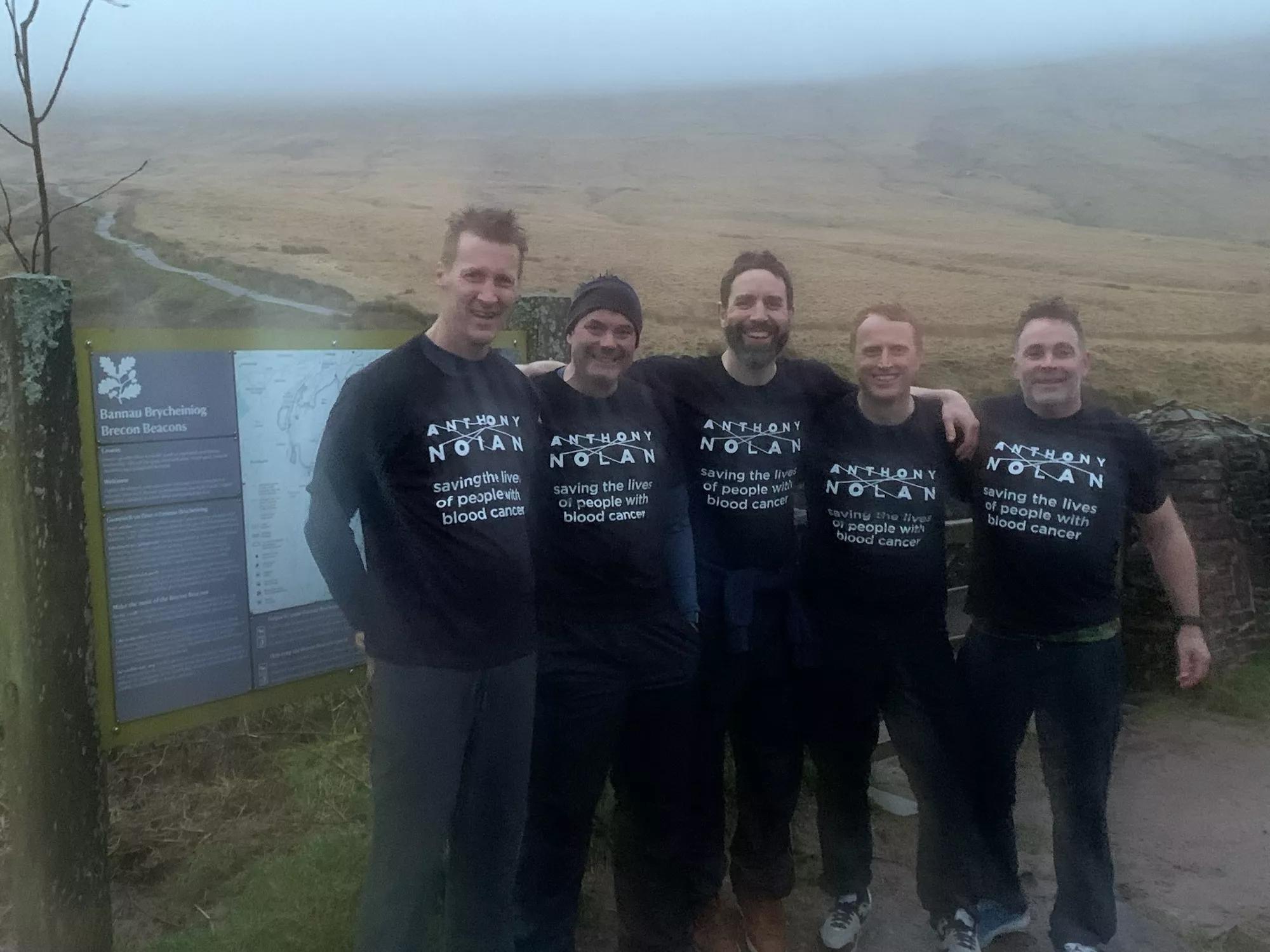 Group of men smiling in their Anthony Nolan t-shirts 