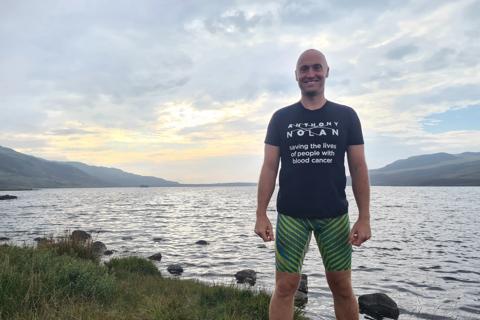 Duncan standing in front of the lake