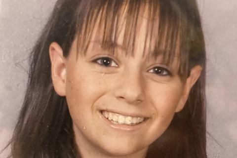 A headshot of Zoe smiling