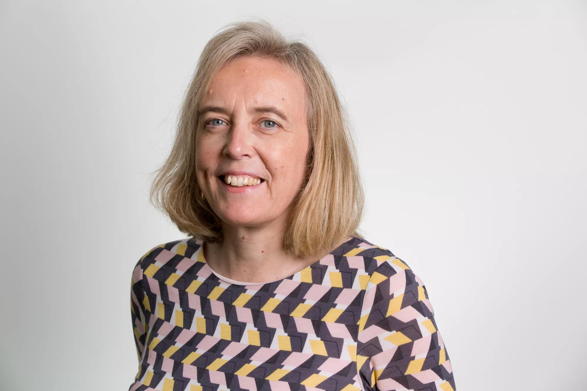 A headshot of Henny Braund, CEO