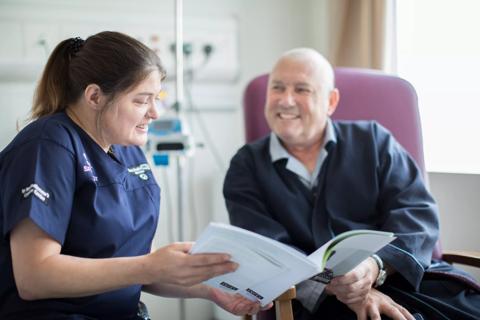 Debbie, Clinical Nurse Specialist, in hospital with a patient