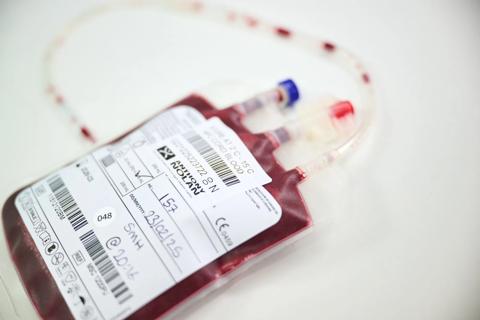 Blood sample bag with white label.