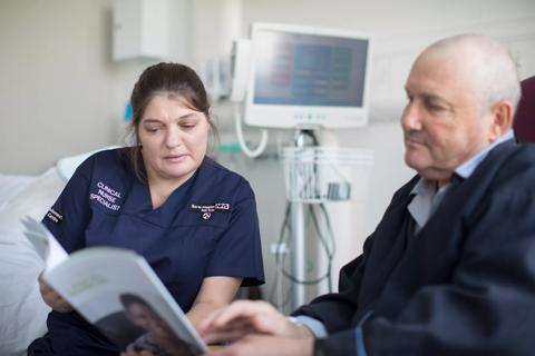 Debbie, Clinical Nurse Specialist, in hospital with a patient