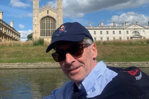 A photo of Philip on a boat in Cambridge