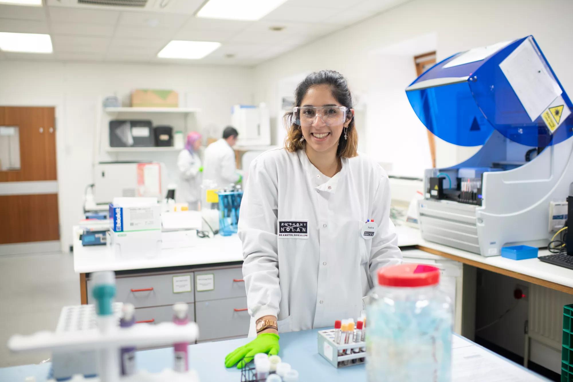 Photo of a female Anthony Nolan Laboratory Scientist working in Anthony Nolan's labs