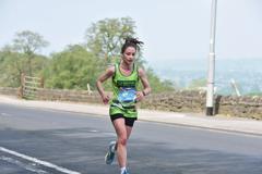 Photo of a woman in her green anthony nolan running vest