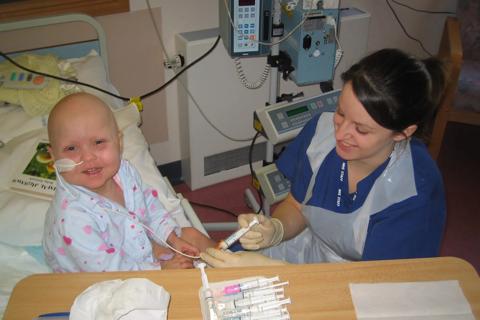 Young girl in hospital with nurse