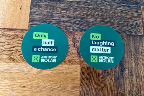 Two beers on Anthony Nolan beermats reading "Only half a chance"