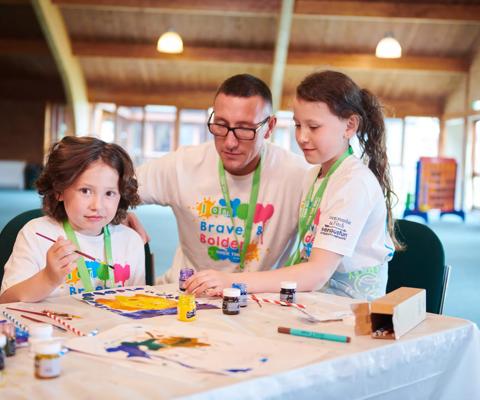 Patients and families taking part in family camp activities