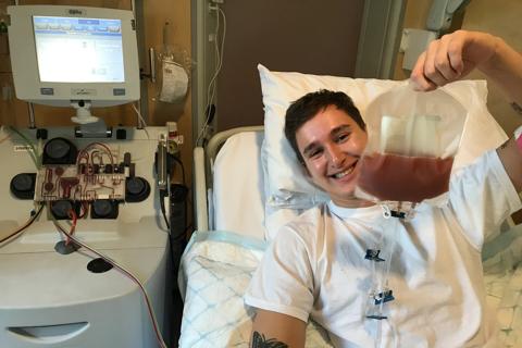 Jacob_Hawley_donating