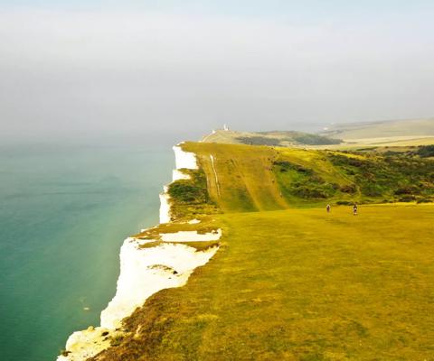 Photo of the South Coast cliffs and the sea