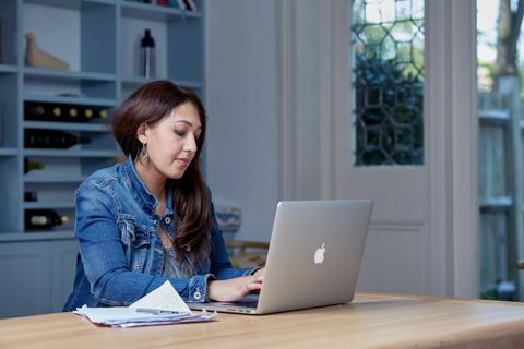 Young female patient using a laptop