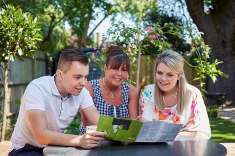 Matt is with his family in the garden. Matt received a stem cell transplant.