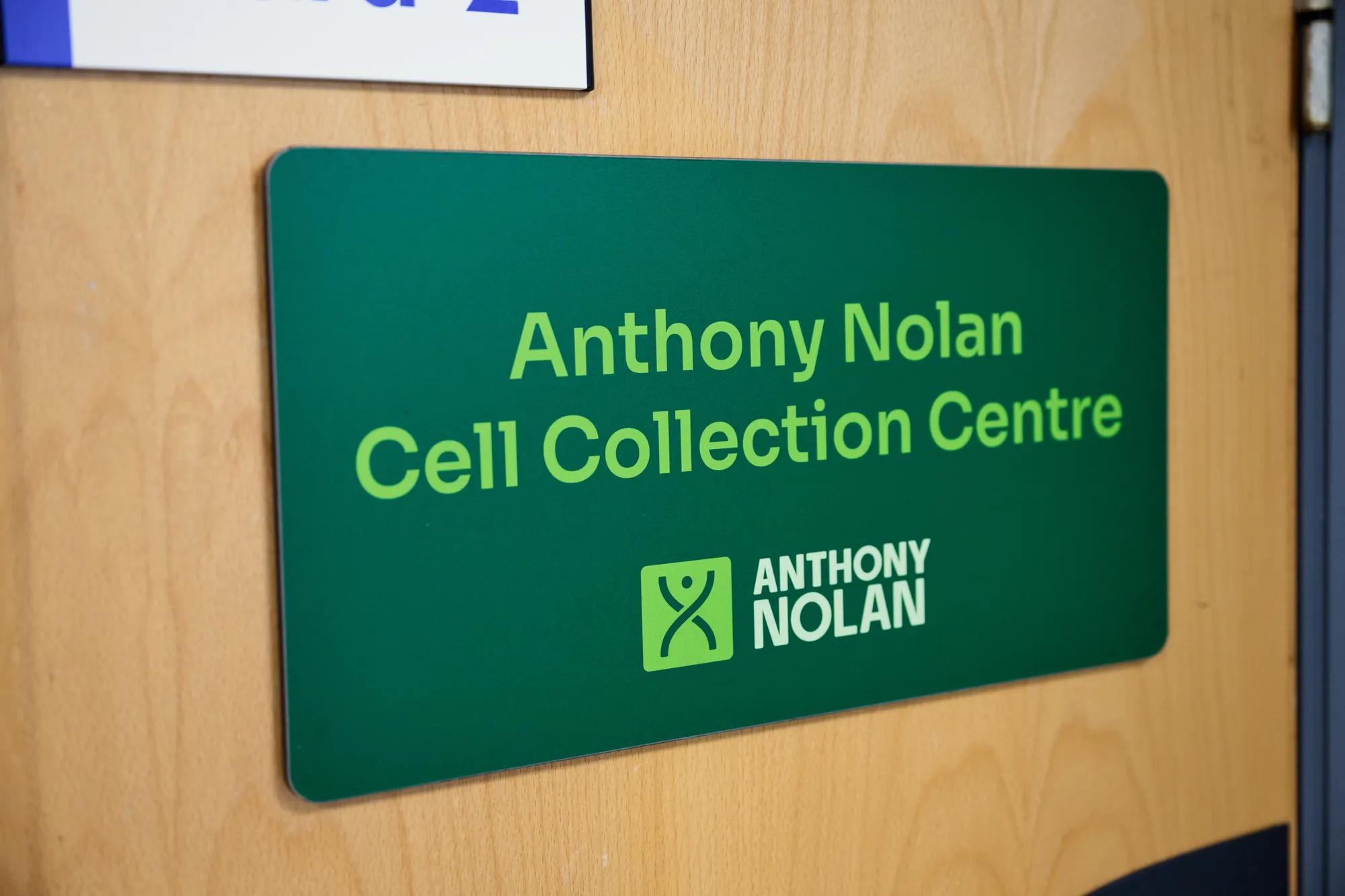 Green sign that says 'Anthony Nolan Cell Collection Centre'.